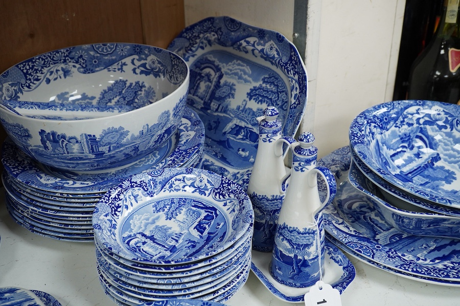 A quantity of Spode Italian dinner ware to include tureens, twin handled soup dishes and platters and a circular bread plate, largest 35cm wide
